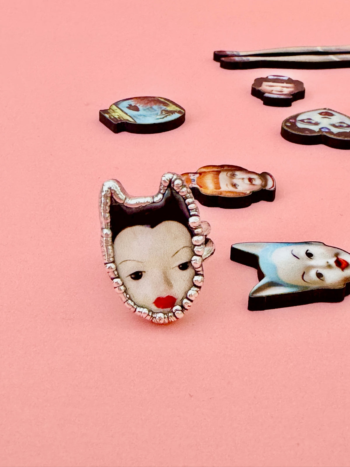 Silver doll head ring from FOXLARK's Weirdlings Collection, size 7, detailed fine silver craftsmanship.